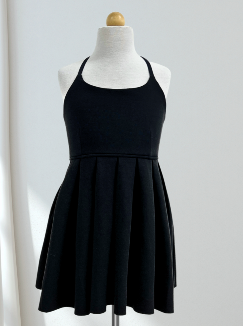 Black dress online with pleated skirt