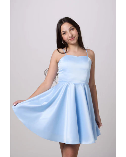 tween girl wearing a light blue satin spaghetti strap fit and flare party dress