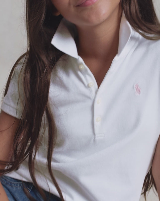 Video of Ralph Lauren girl in white polo shirt